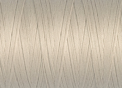 Spool of cream Gutermann Miniking recycled overlocker thread