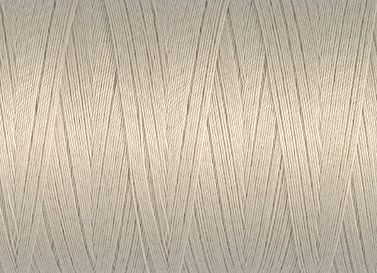 Spool of cream Gutermann Miniking recycled overlocker thread