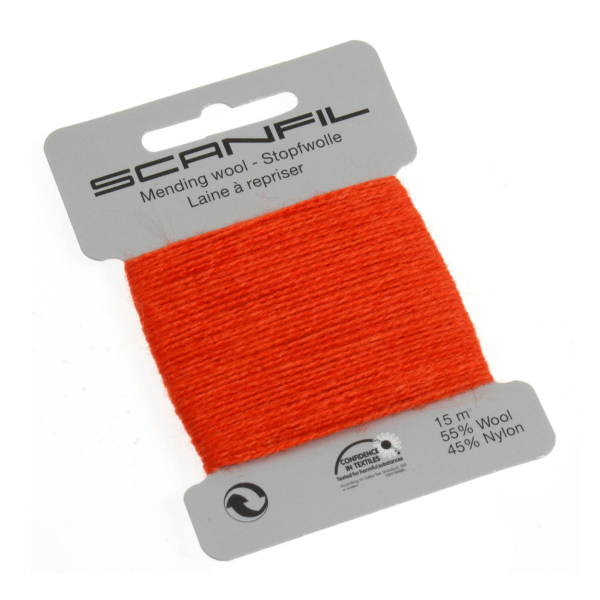 Card of Scanfil mending wool in flame