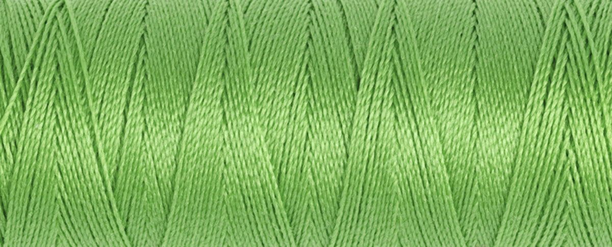 Spool of lime green Gutermann Maraflex elastic sewing thread