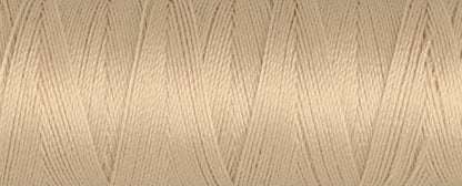 Spool of fawn Gutermann Maraflex elastic sewing thread