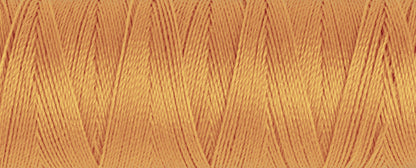 Spool of Gutermann Maraflex elastic thread in apricot