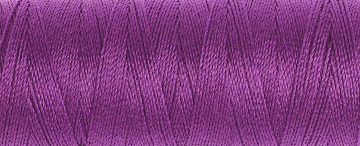 Spool of dark cerise Gutermann Maraflex elastic sewing thread