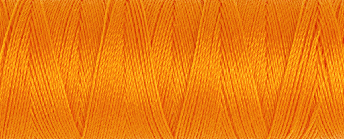 Spool of orange Gutermann Maraflex elastic sewing thread