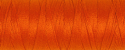 Spool of dark orange Gutermann Maraflex elastic sewing thread