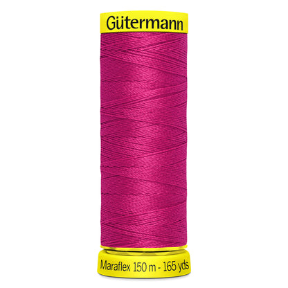 Spool of Gutermann Maraflex elastic thread in bright crimson