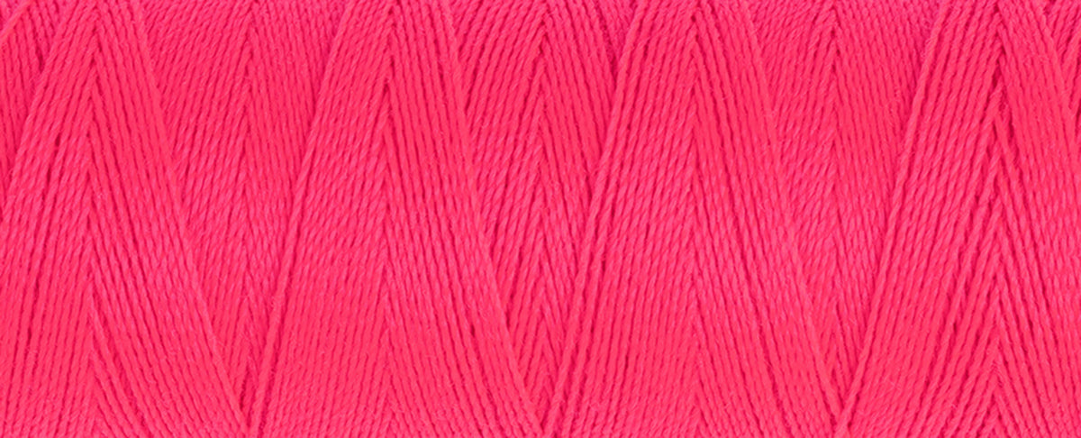 Spool of neon pink Gutermann Maraflex elastic sewing thread