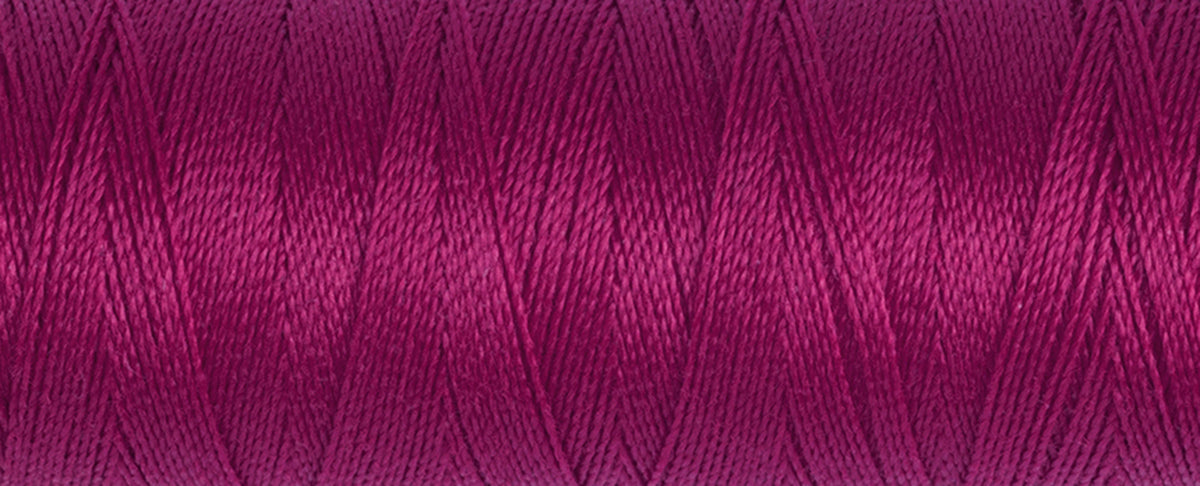Spool of crimson Gutermann Maraflex elastic sewing thread