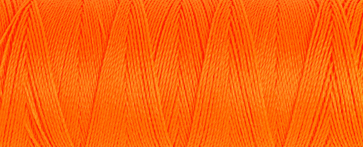Spool of neon orange Gutermann Maraflex elastic sewing thread