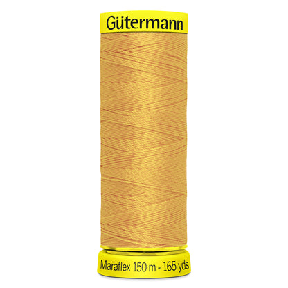 Spool of honey Gutermann Maraflex elastic sewing thread