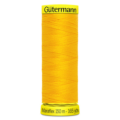 Spool of gold Gutermann Maraflex elastic sewing thread