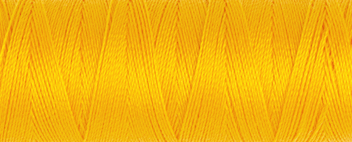 Spool of gold Gutermann Maraflex elastic sewing thread