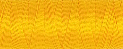 Spool of gold Gutermann Maraflex elastic sewing thread
