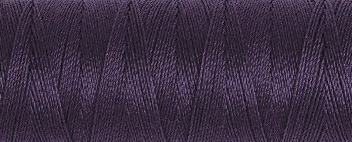 Spool of Gutermann Maraflex elastic thread in aubergine