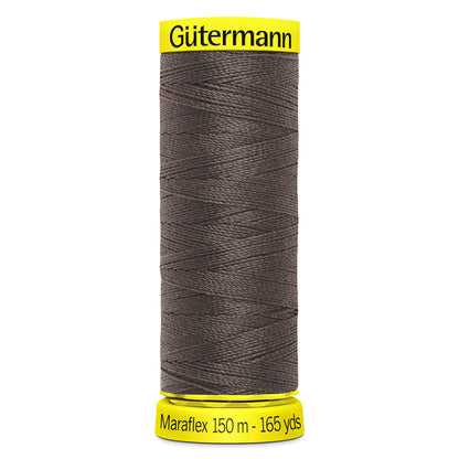 Spool of grey brown Gutermann Maraflex elastic sewing thread