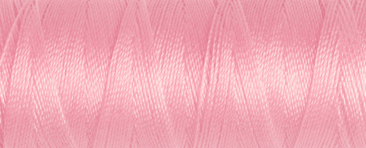 Spool of pink Gutermann Maraflex elastic sewing thread