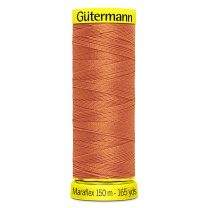 Spool of Gutermann Maraflex elastic thread in coral