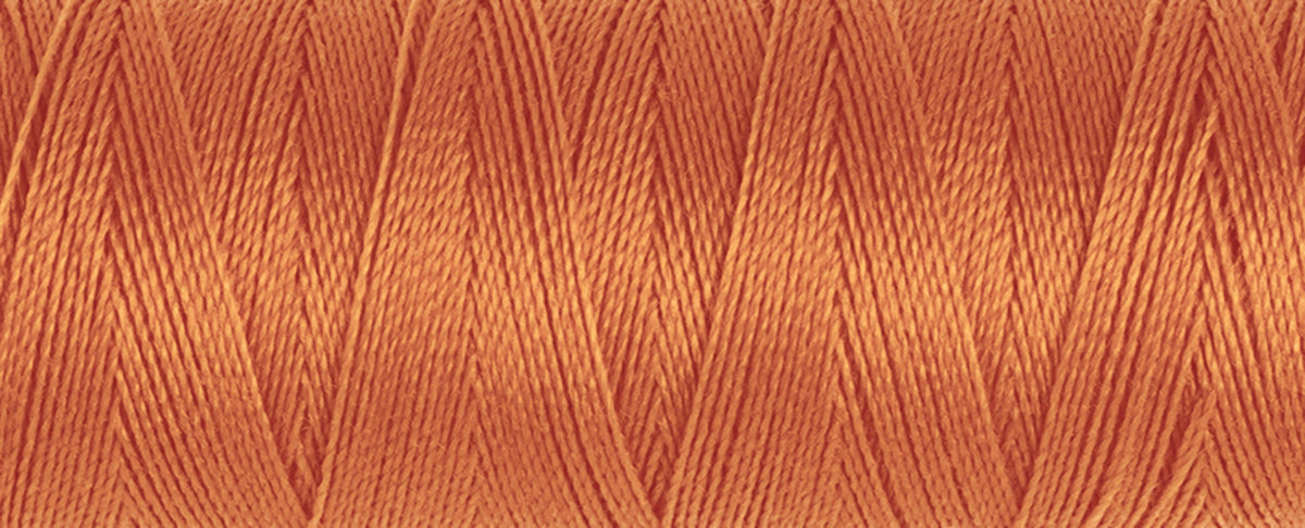 Spool of Gutermann Maraflex elastic thread in coral