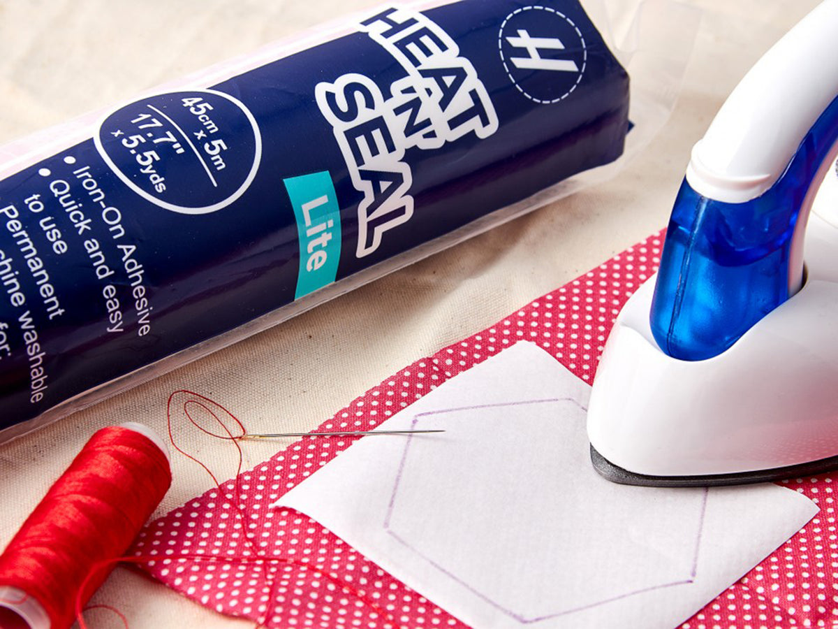 Pack of Hemline Heat 'n' Seal Lite iron-on adhesive
