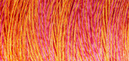 Madeira Aeroflock textured overlock thread on a mini king spool in coral fish