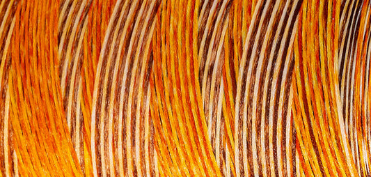 Madeira Aeroflock textured overlock thread on a mini king spool in savanna