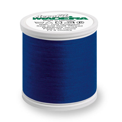 Spool of Madeira Aerofil sewing thread in deep purple