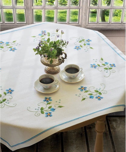 Anchor cross stitch tablecloth with blue flower design