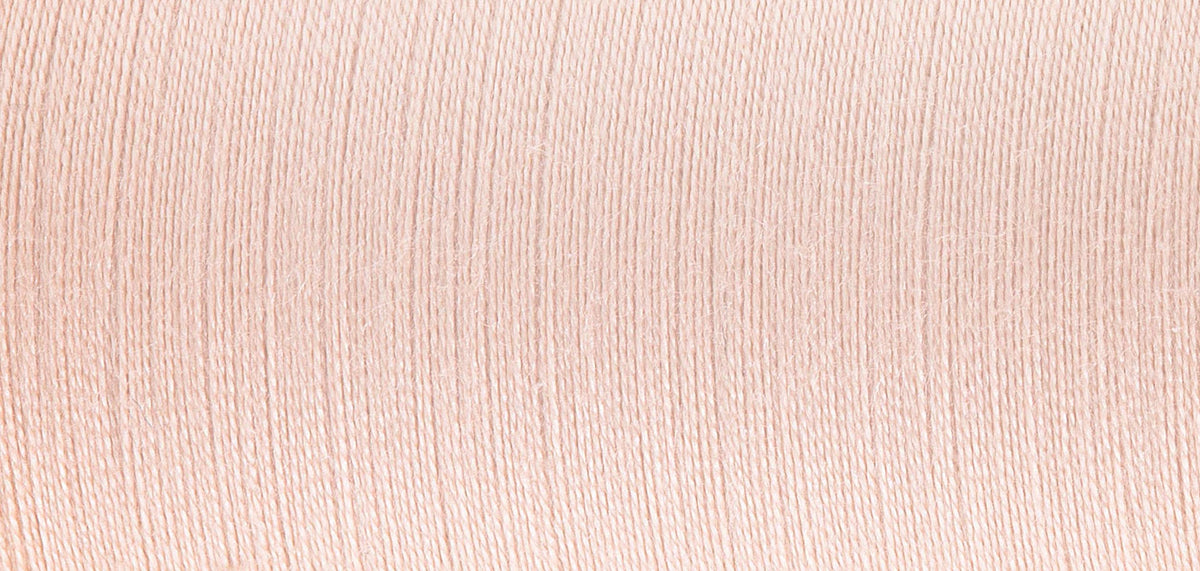 Spool of Madeira Sensa Green No. 40 embroidery thread in Peach