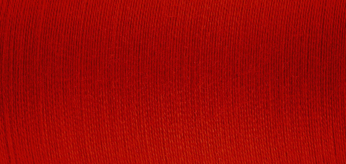 Spool of Madeira Sensa Green No. 40 embroidery thread in Ruby