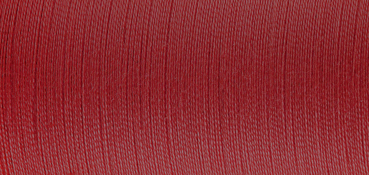 Spool of Madeira Sensa Green embroidery thread in wild cherry