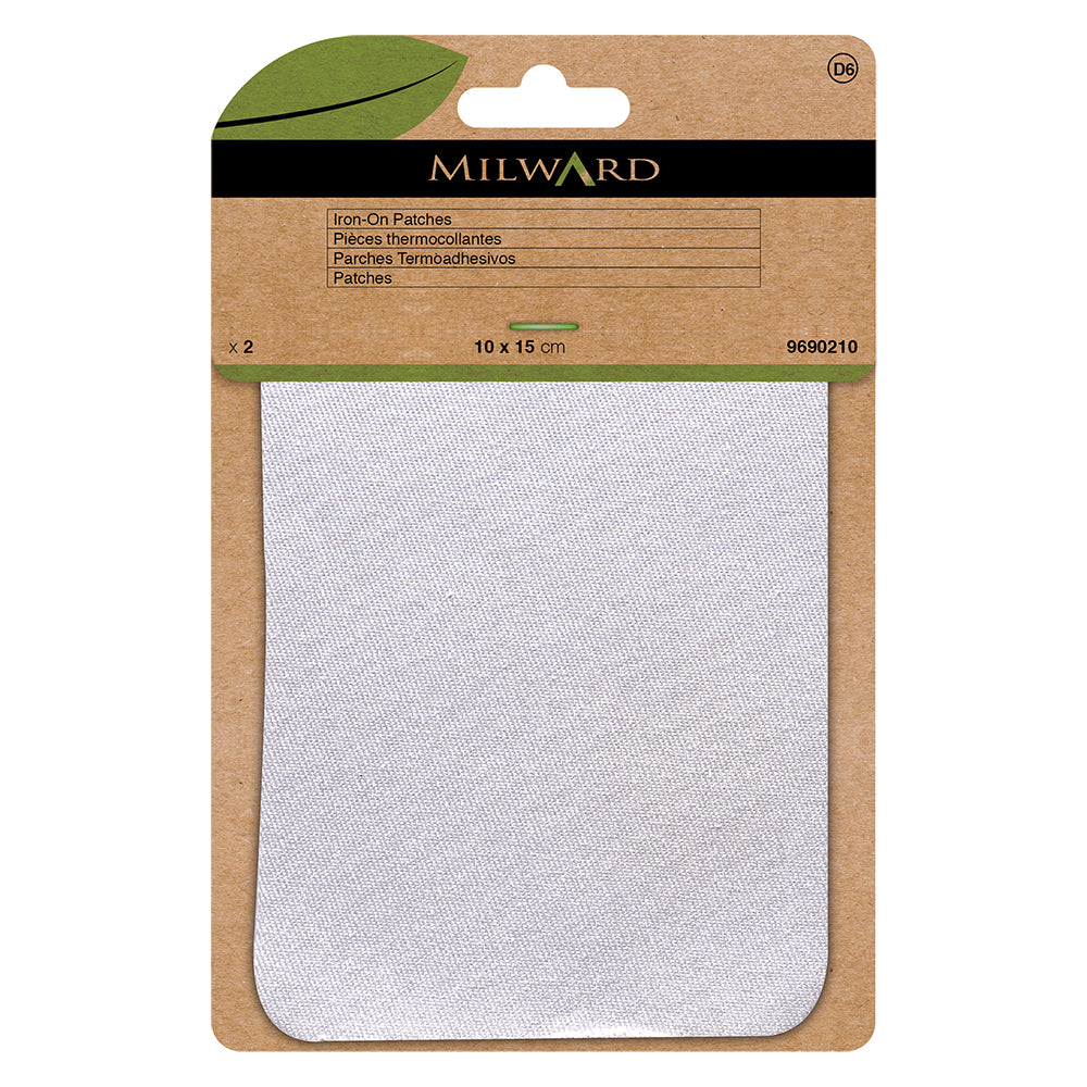 Two white twill patches in Milward Green packaging