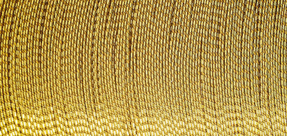 Spool of Madeira Glamour metallic thread in antique gold