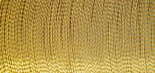 Spool of Madeira Glamour metallic thread in antique gold