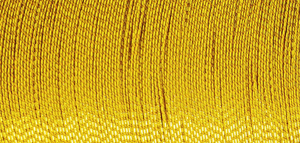 Spool of Madeira Glamour metallic thread in gold nugget