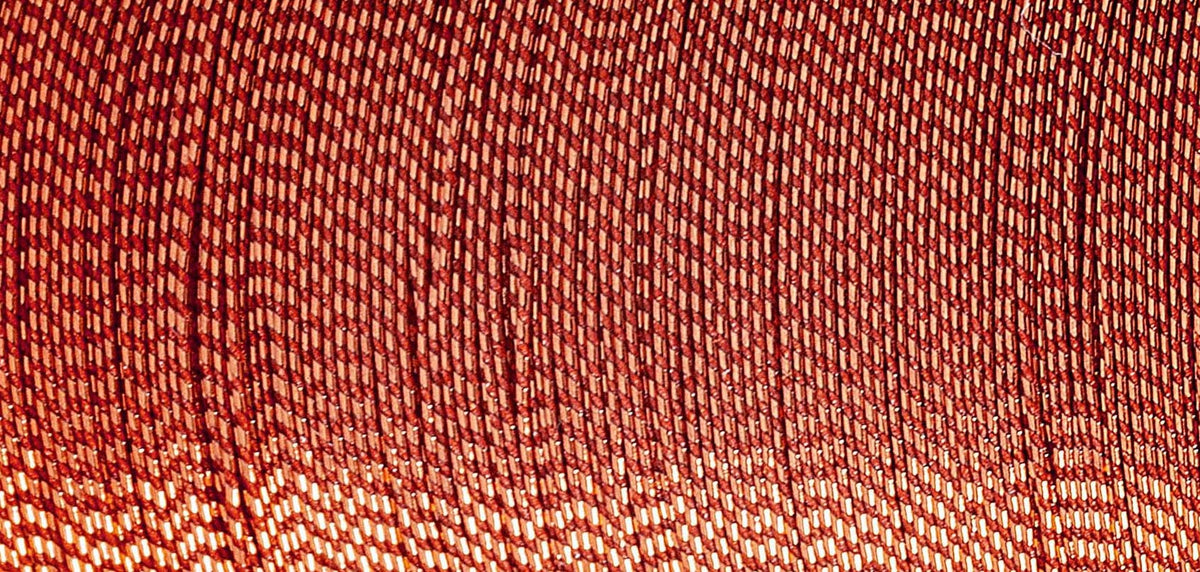 Spool of Madeira Glamour metallic thread in copper