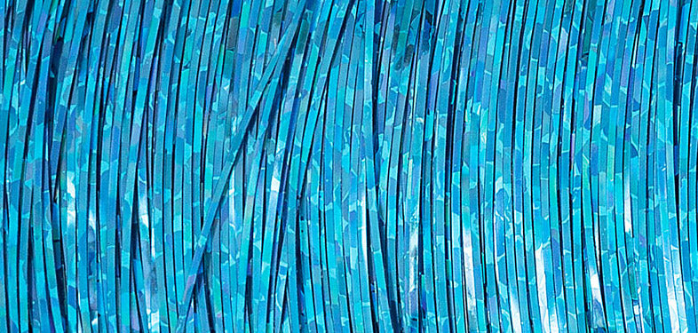 Spool of Madeira Spectra holographic thread in blue