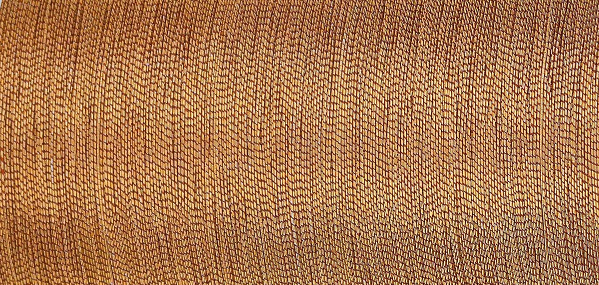 Spool of Madeira Smooth metallic thread in rose gold