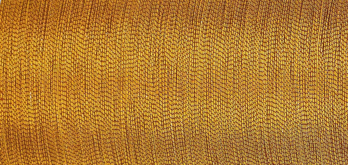 Spool of Madeira Smooth metallic thread in sultan gold