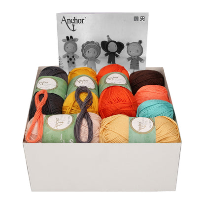 Four crocheted jungle animal amigurumi dolls from the Anchor Creativa kit