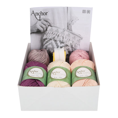 Crocheted boho zip pouch in bougainville colours from the Anchor kit