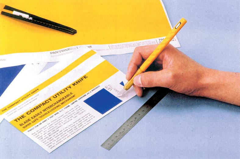 Olfa pen-style art knife with blades