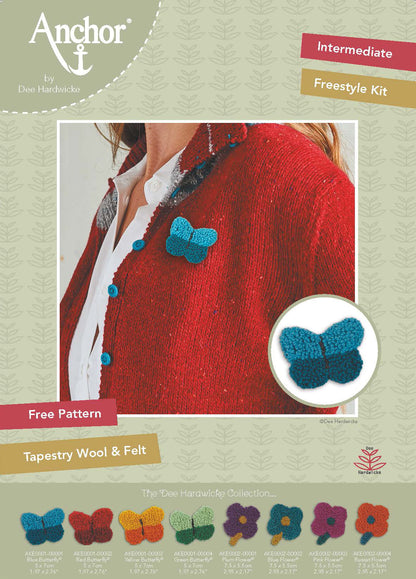 Blue embroidered butterfly brooch made with French knots