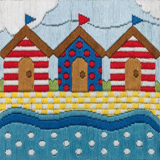 Long stitch picture of colourful beach huts