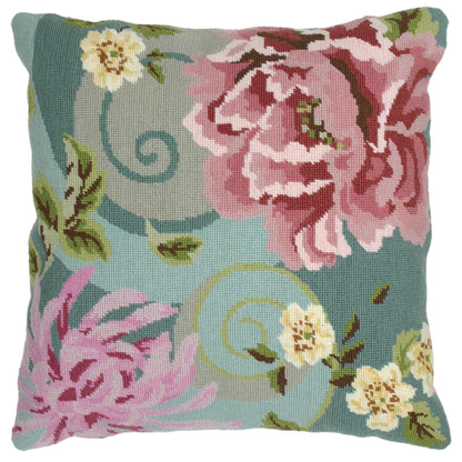 Tapestry cushion with a green floral swirl design