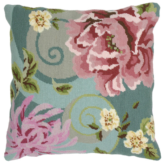 Tapestry cushion with a green floral swirl design