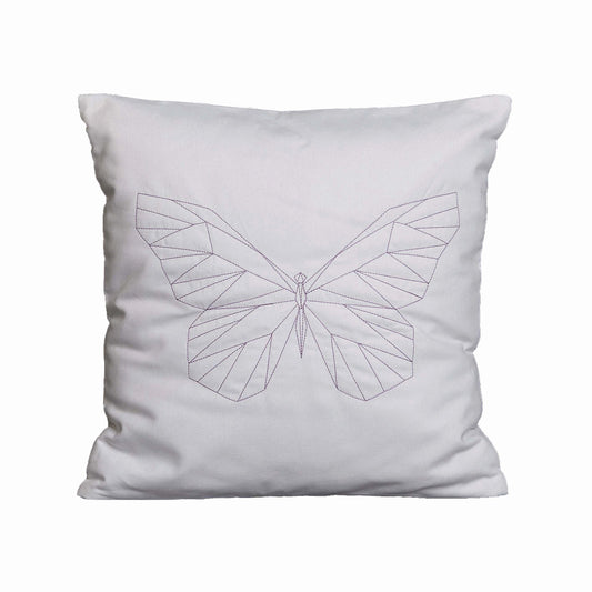 Cushion with a metallic geometric butterfly design
