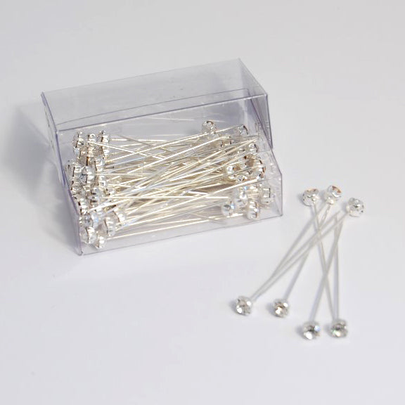 Silver corsage pins with diamante heads