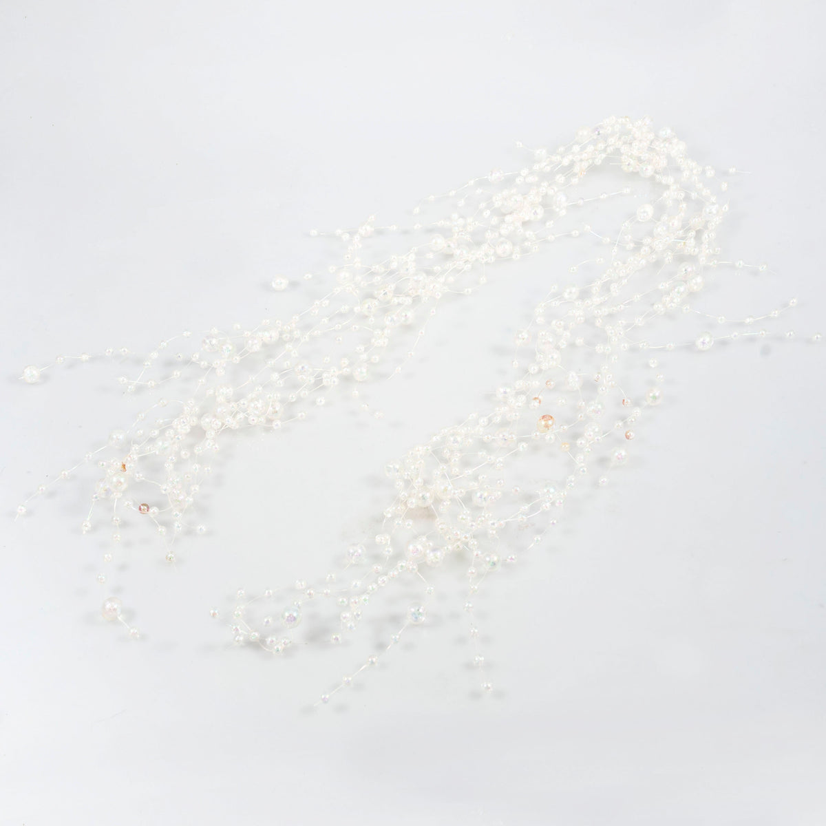 Strand of iridescent and clear mixed bead garland