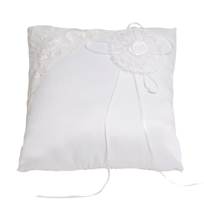 White ring cushion with lace trim