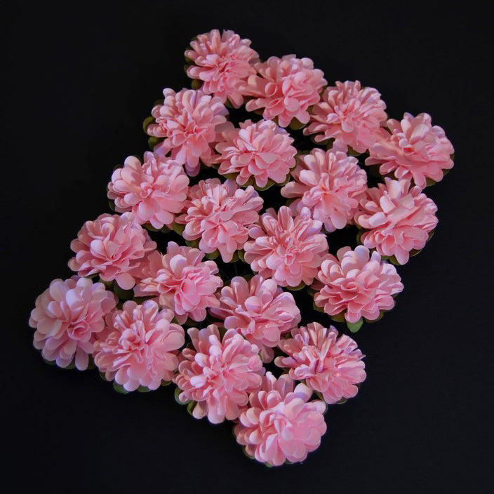 Pink paper flower heads